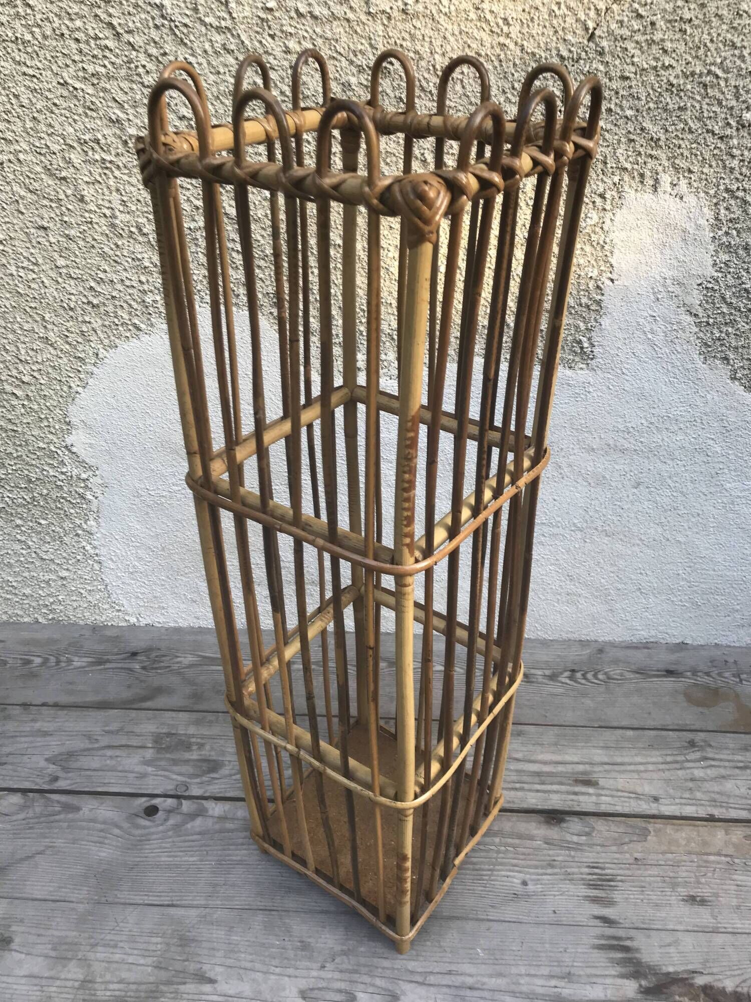 Old woven rattan umbrella holder from the 60's