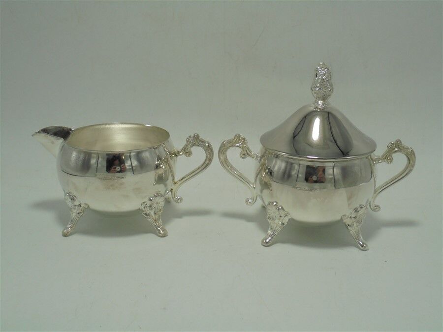 Sugar bowl and milk jar on tray
