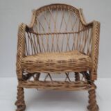 child's or doll's armchair in light woven wicker