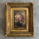 Golden framed flower bouquet painting