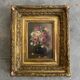 Golden framed flower bouquet painting