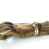 Brass hand, paper press, 50s