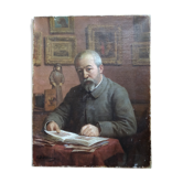 Portrait of a man at his desk