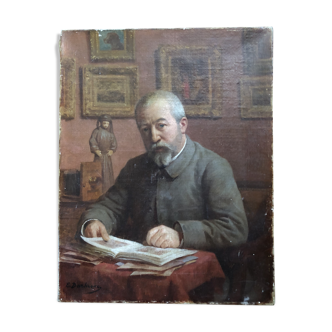 Portrait of a man at his desk