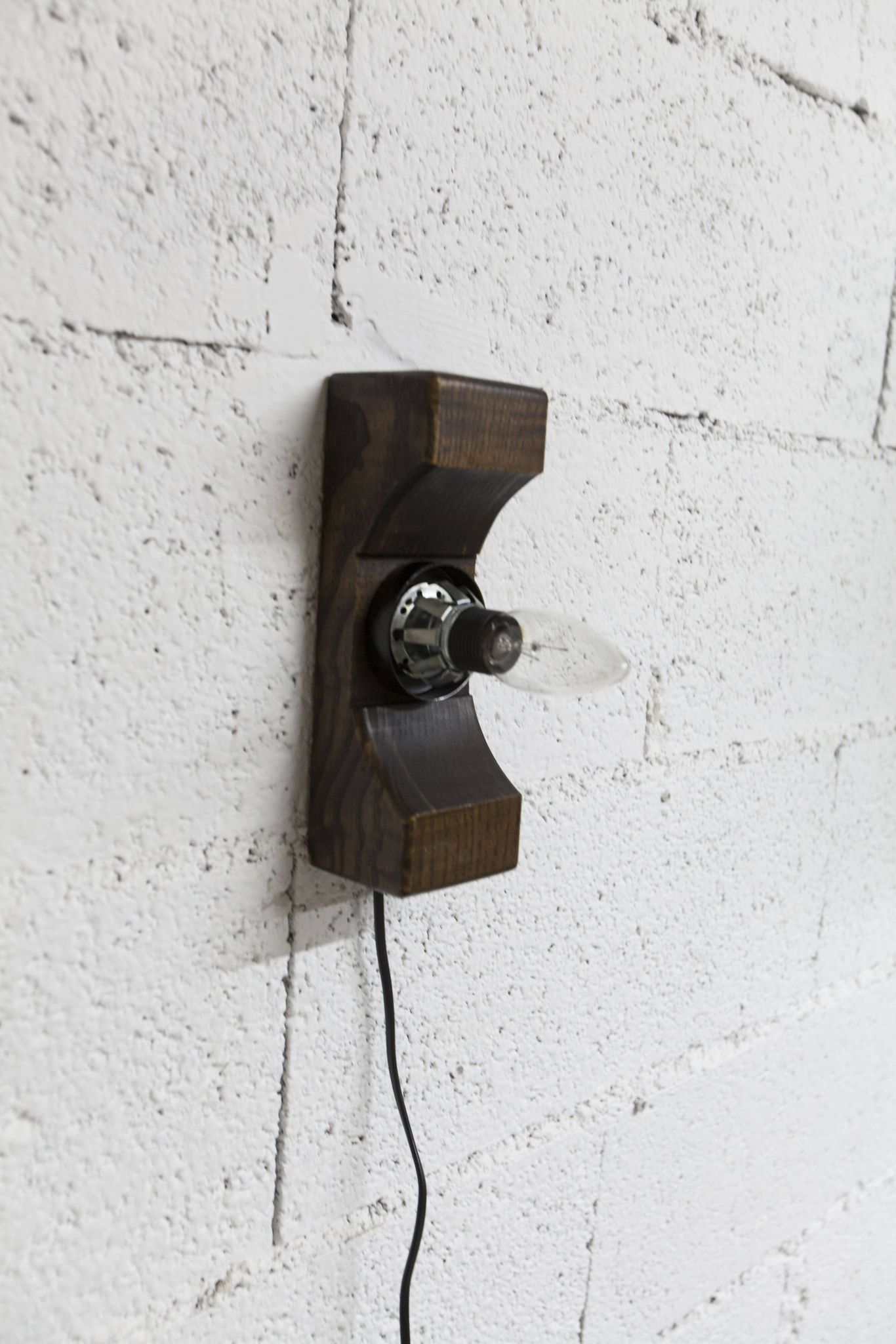 1960s ball wall light in dark wood and amber glass