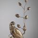 Pair of wall sconces with parrots and leaves