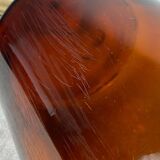 Large amber glass apothecary bottle with spout