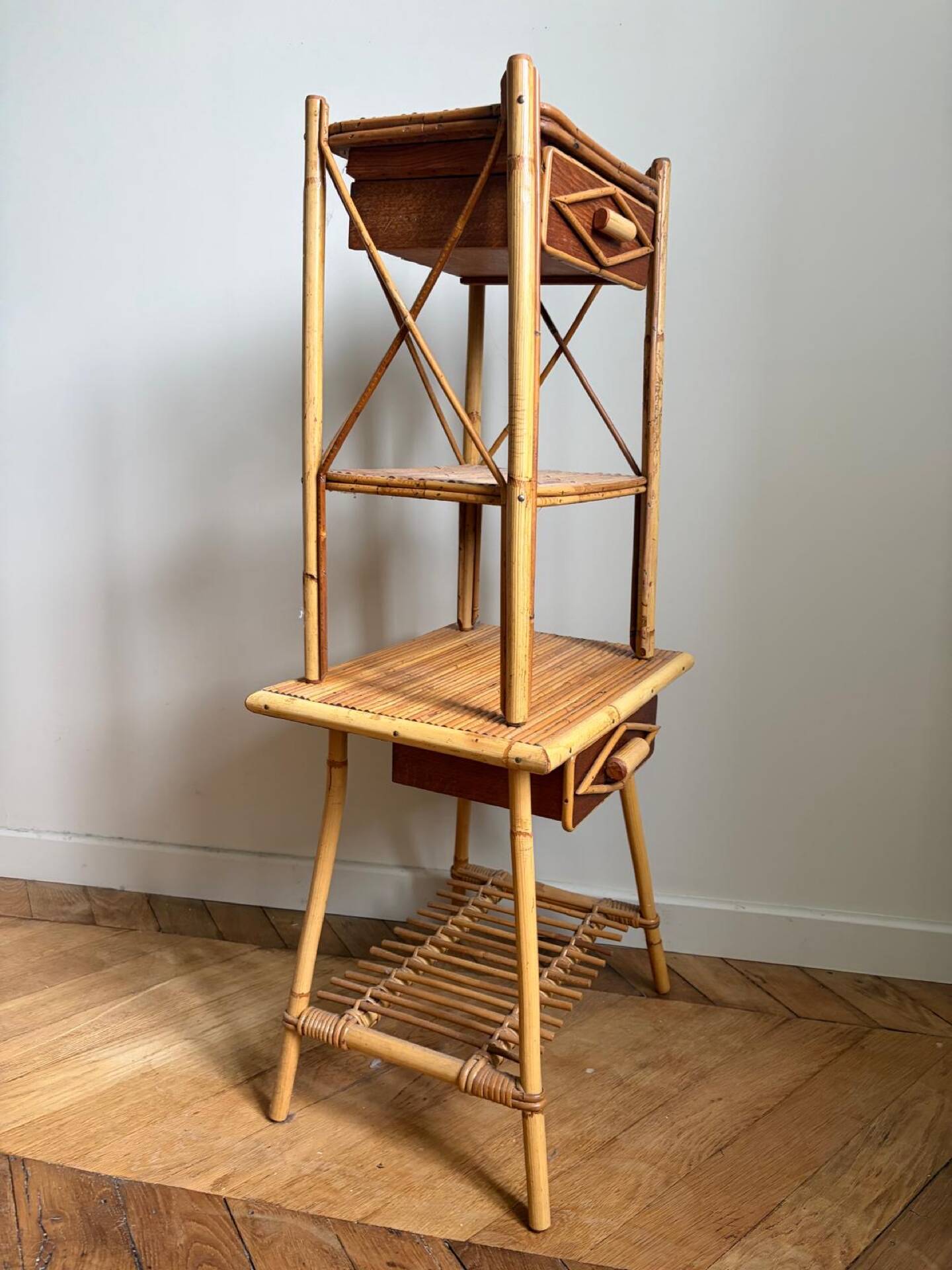 Rattan bedside tables in the style of Audoux Minet.