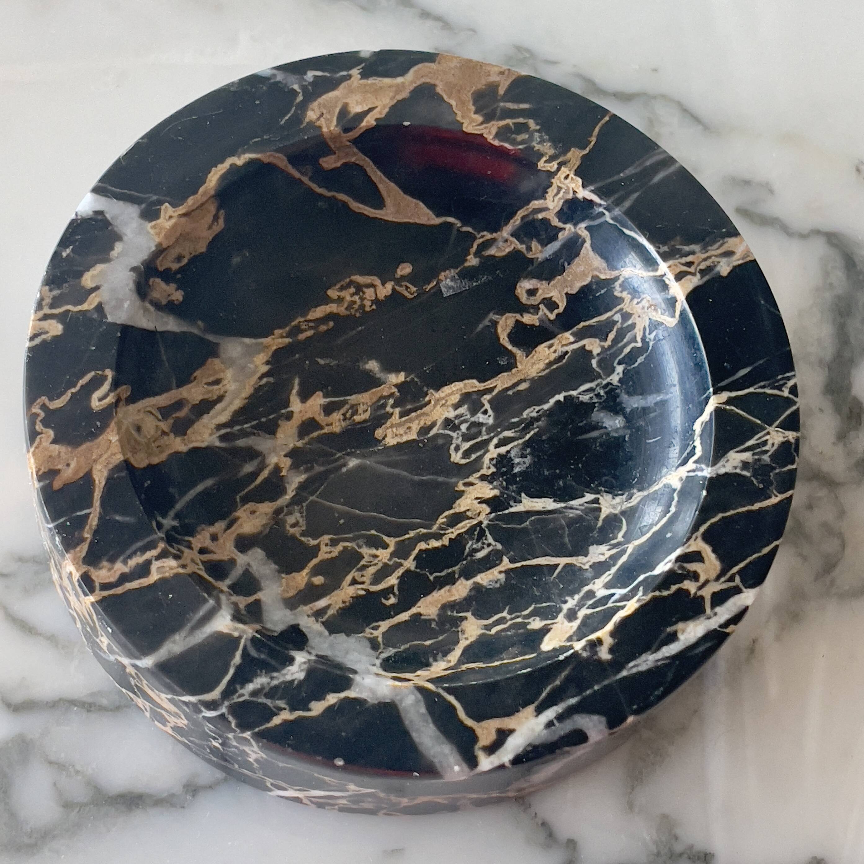 Marble pocket emptier