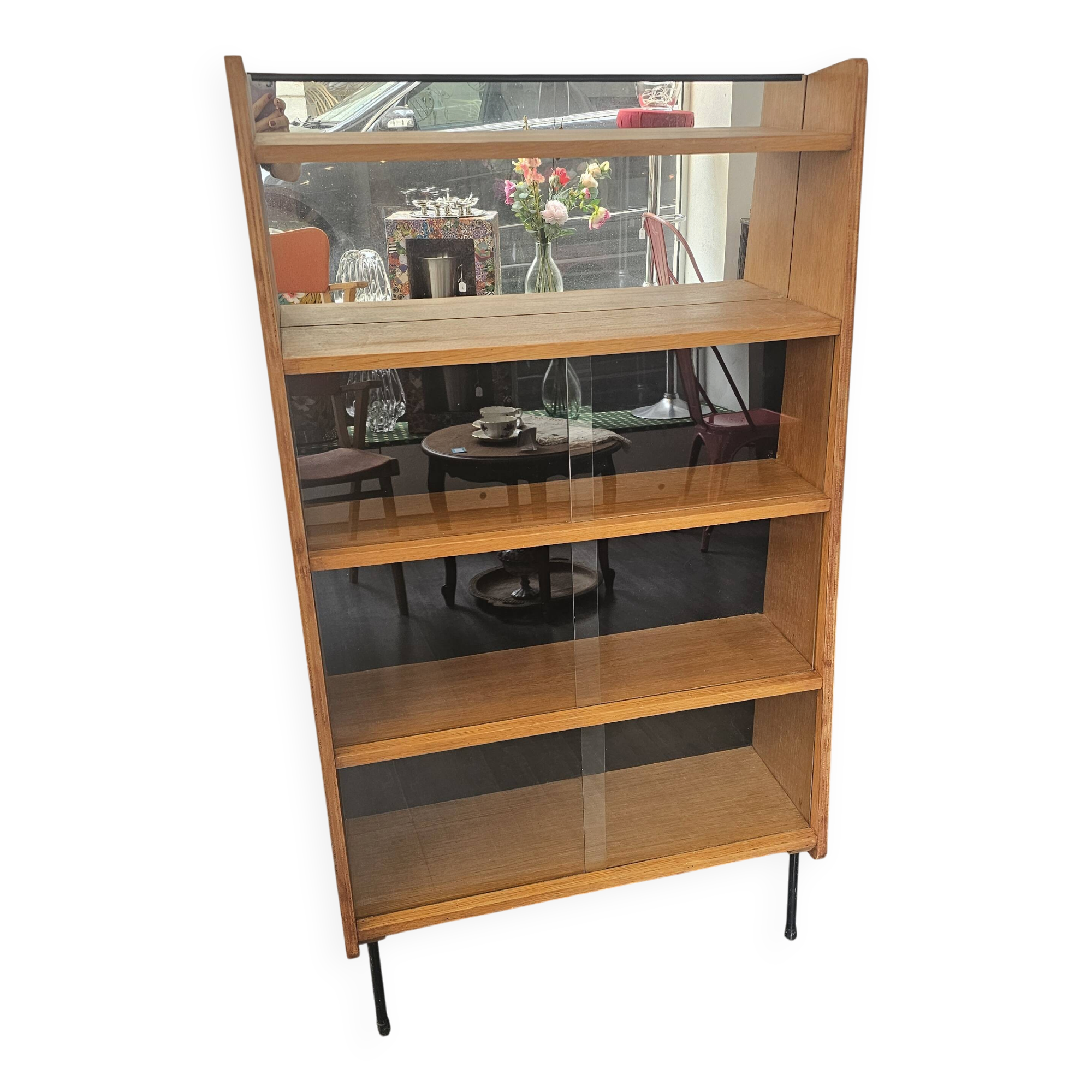 Modernist showcase library with sliding glass doors