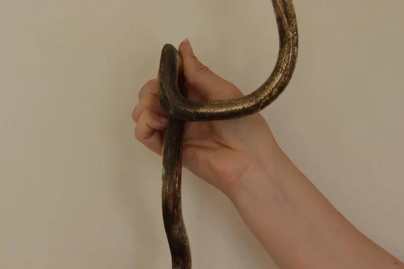 Pair of Neo-Egyptian Style Engraved Brass Wall Sconces Featuring Cobras