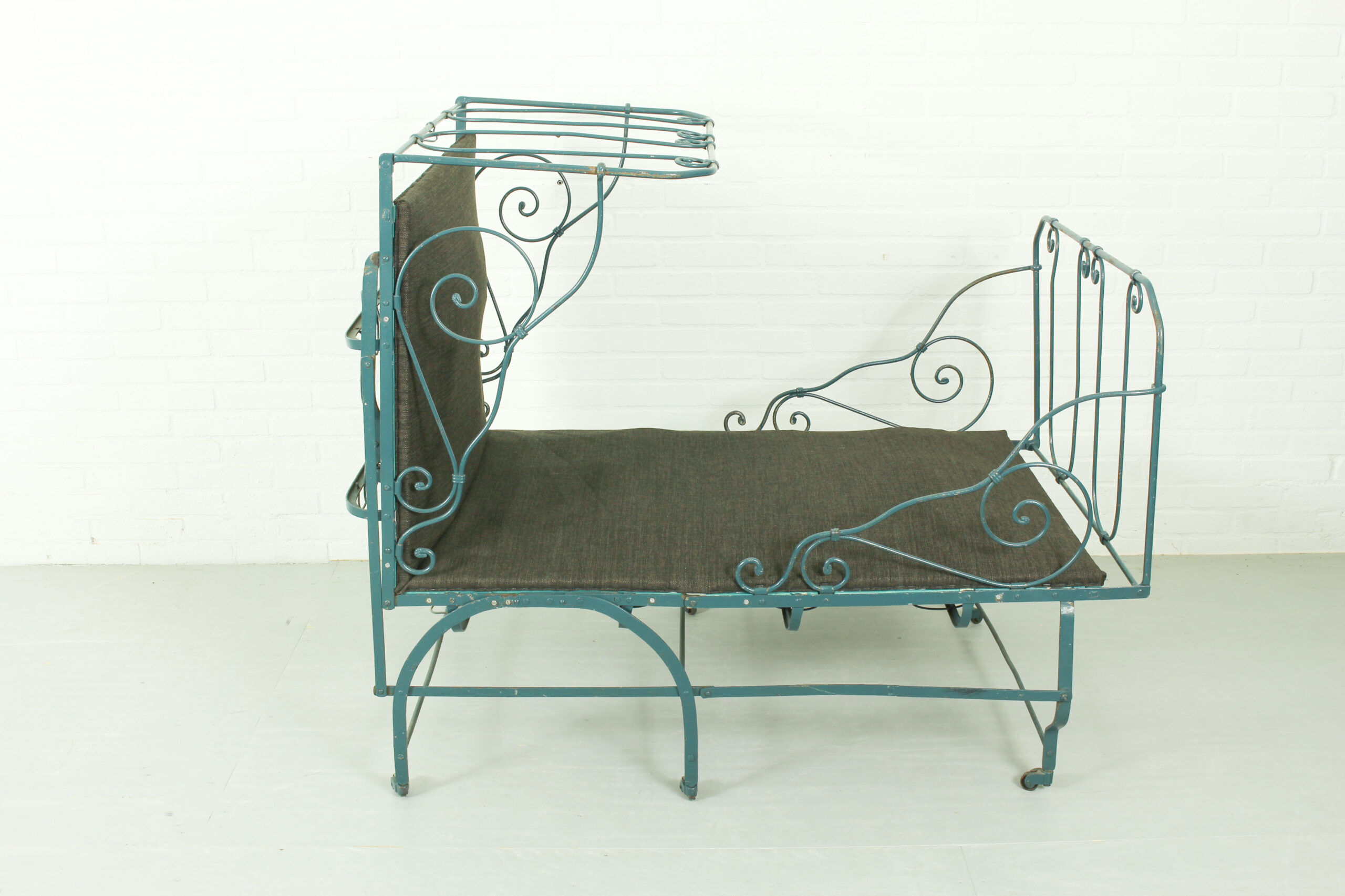 Foldable metal daybed with new webbing and upholstery