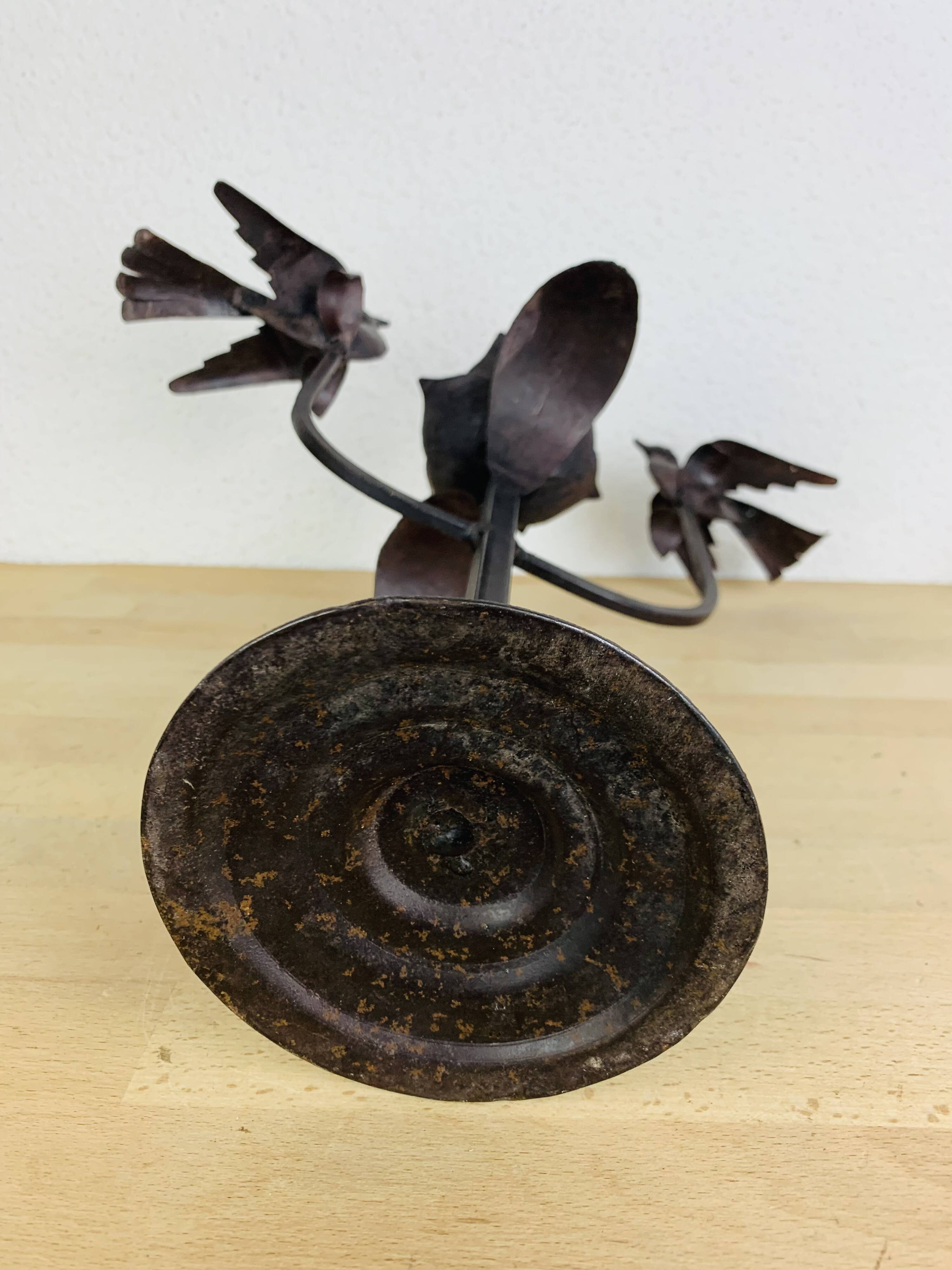 Brutalist wrought iron candle holder with birds