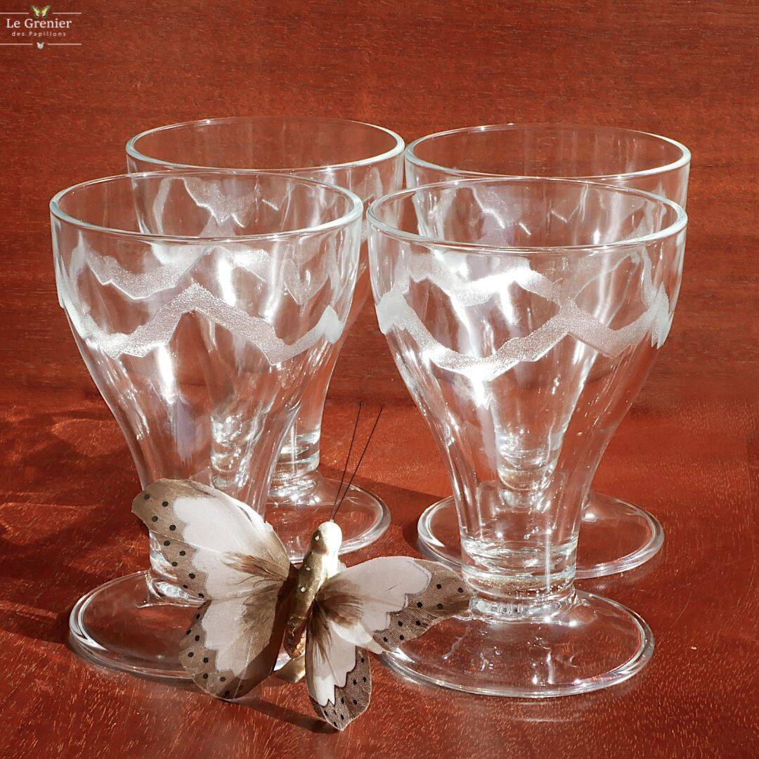 4 large water glasses or Evian ice cream cups