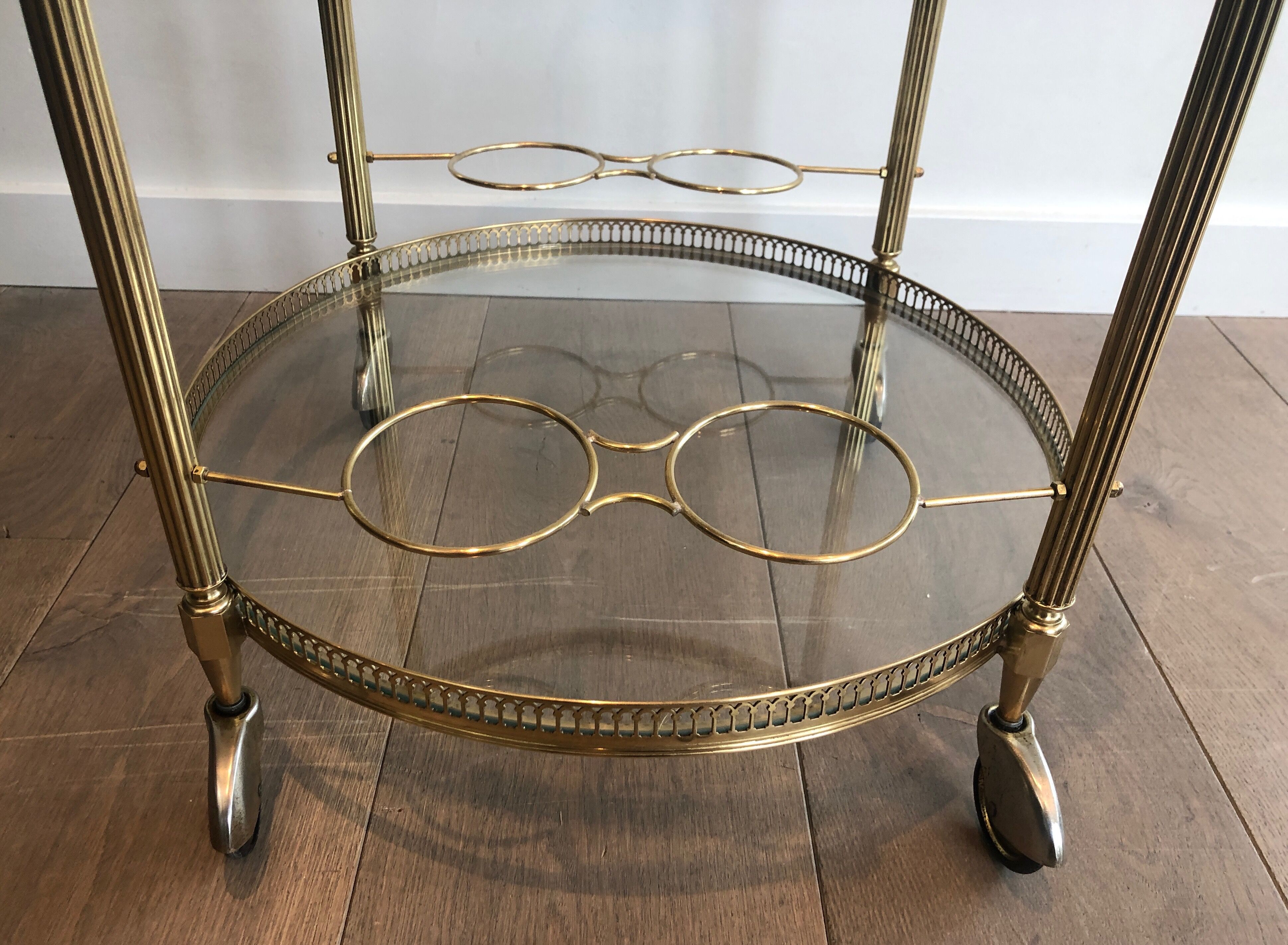 Neoclassical style rolling table in brass