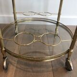 Neoclassical style rolling table in brass