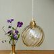 Suspension globe vintage en verre ambré