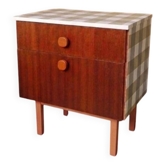 Wooden bedside table and gingham