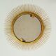 Golden metal sun mirror of the 1950s
