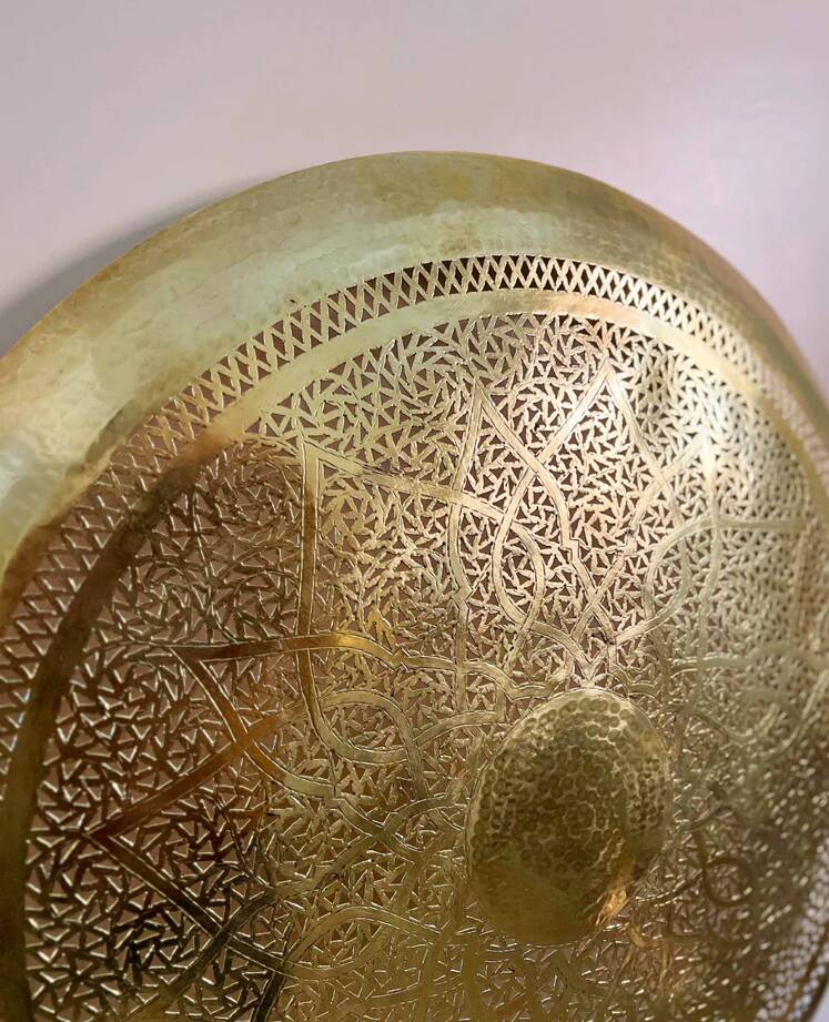Large oriental wall lamp in hammered gold-plated perforated brass, 100 cm.