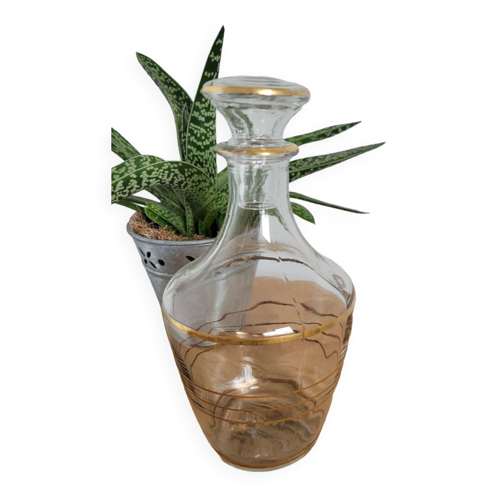 Small glass bottle with gold edges