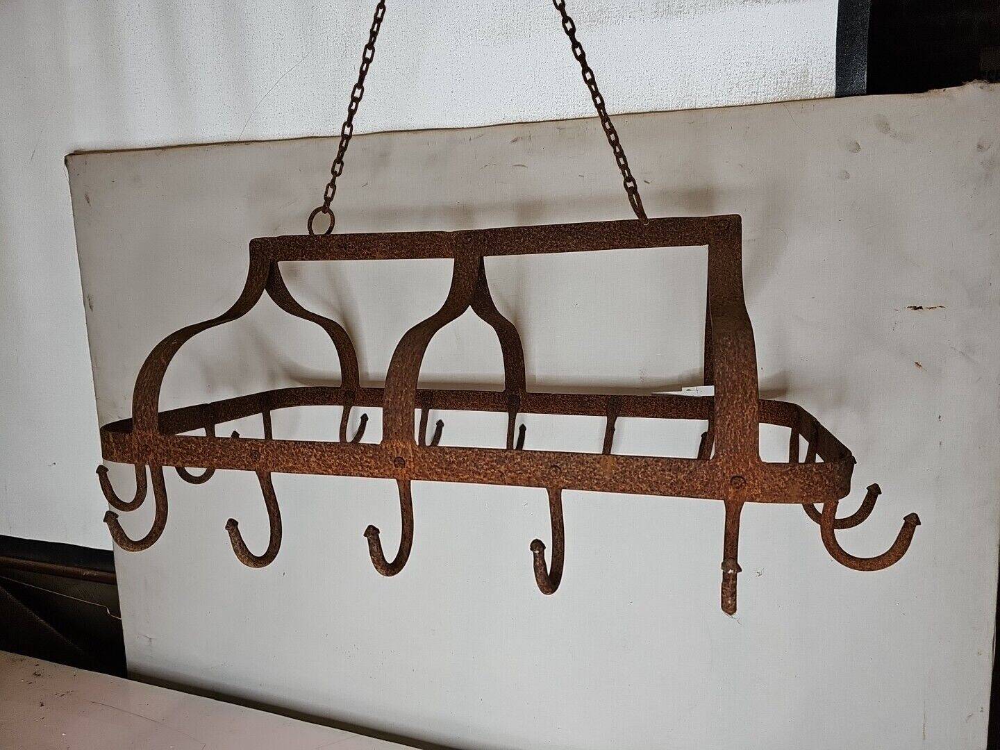 pig holder, wrought iron hook support