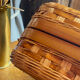Wicker and wood suitcase