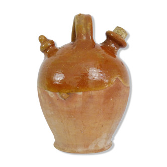 Old gargoulette jug, chevrette, water pitcher in glazed yellow sandstone. Mid-twentieth century