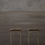 A pair of antique Danish stools, seats in lambswool, late 19th century.