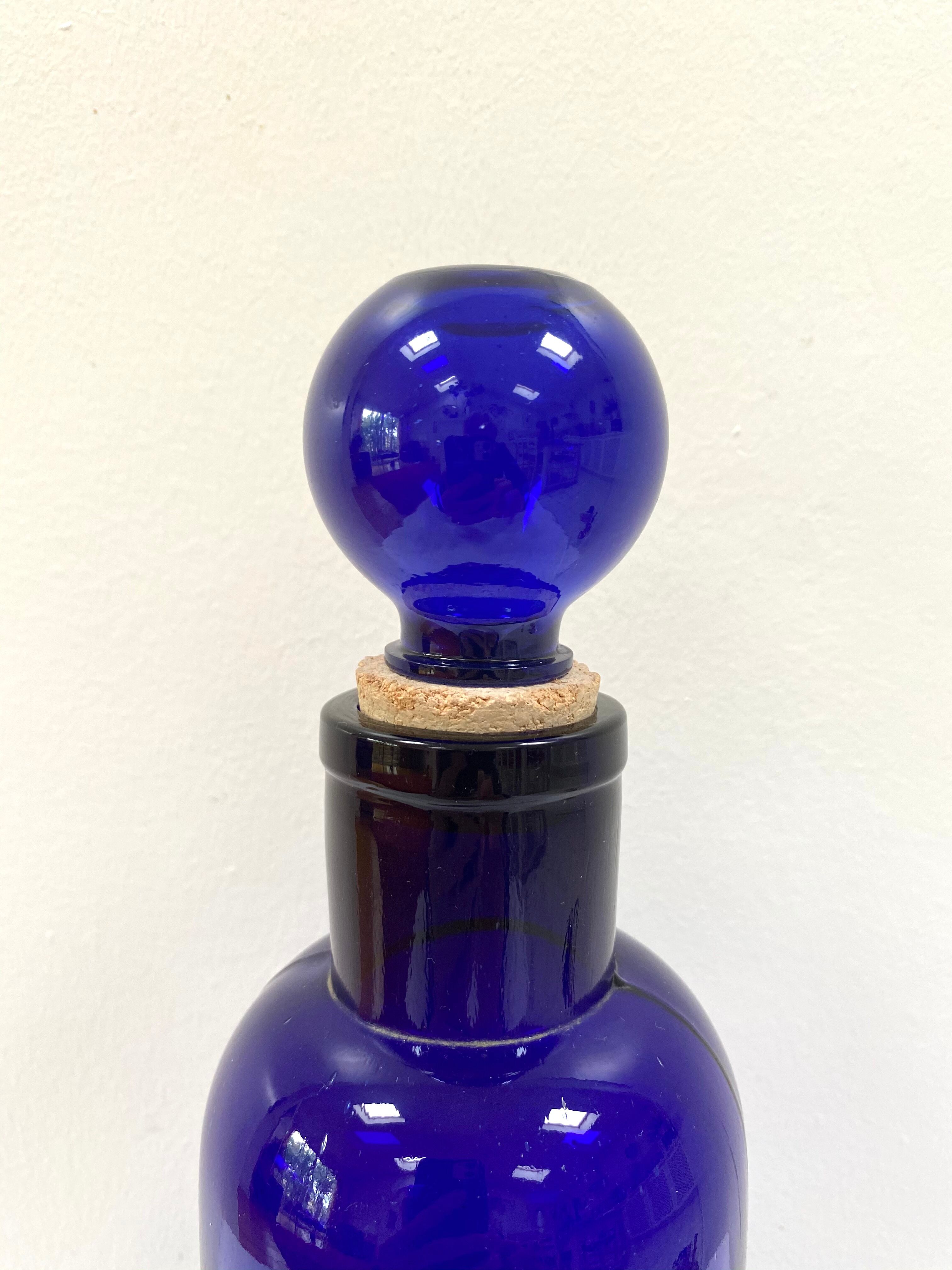 Old apothecary bottle in cobalt blue glass
