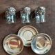 Set of 3 small metal glasses and saucers