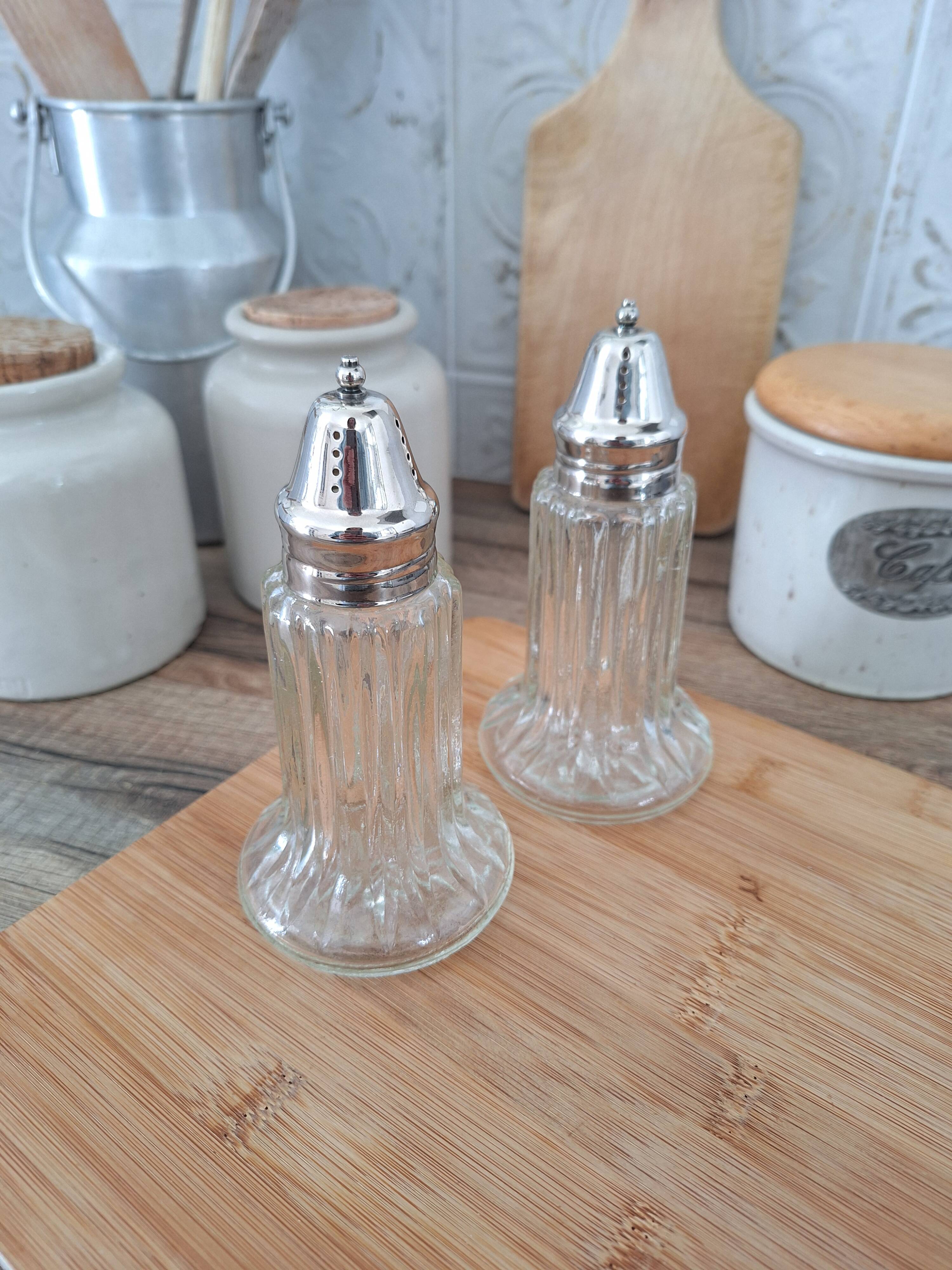 Glass and metal salt and pepper shakers