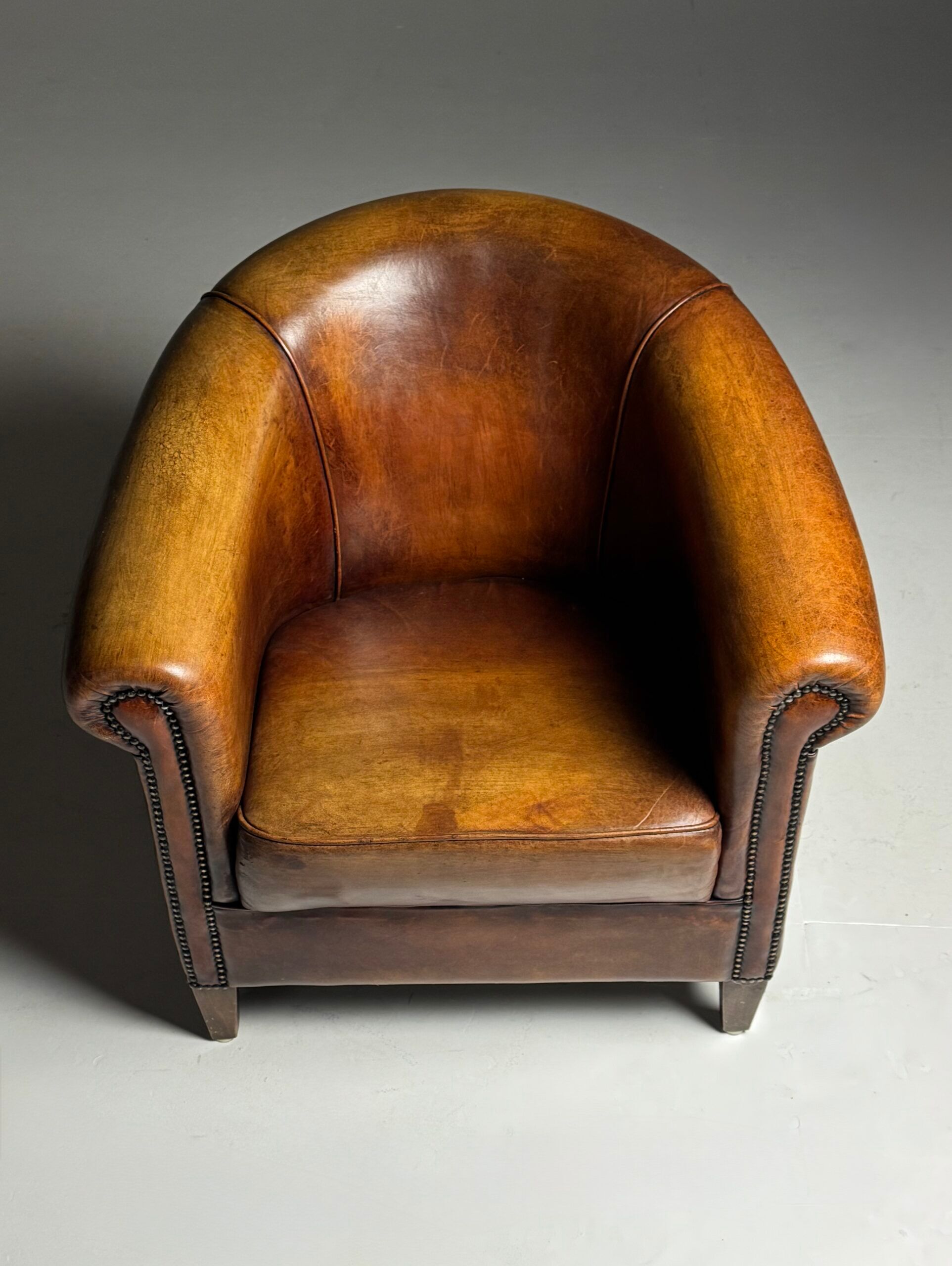 Fauteuil club en peau de mouton 2x classique