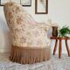 Antique flowered toad armchair with fringes