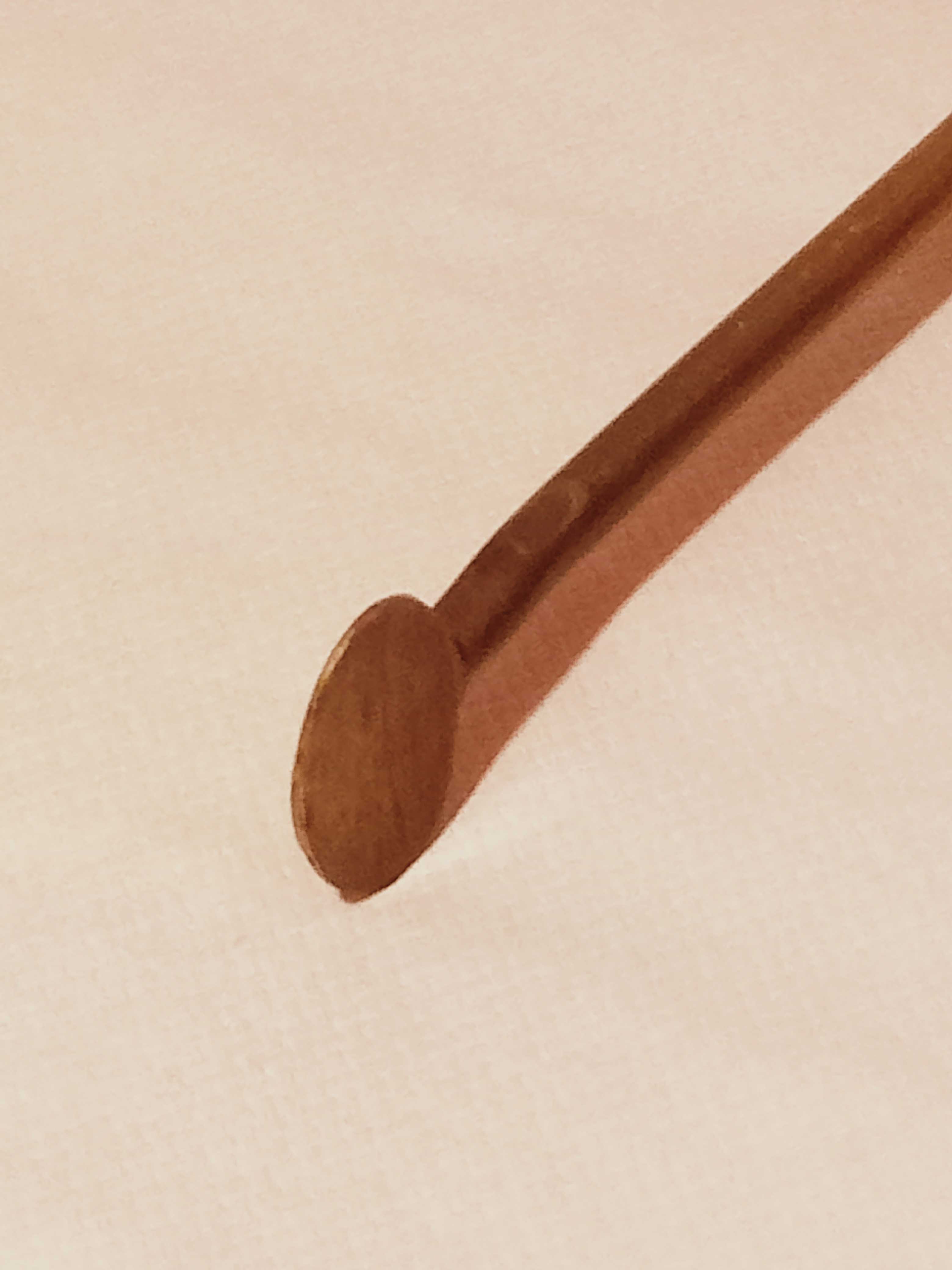 Old bronze or brass fireplace clamp