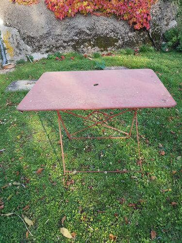Red folding metal garden table