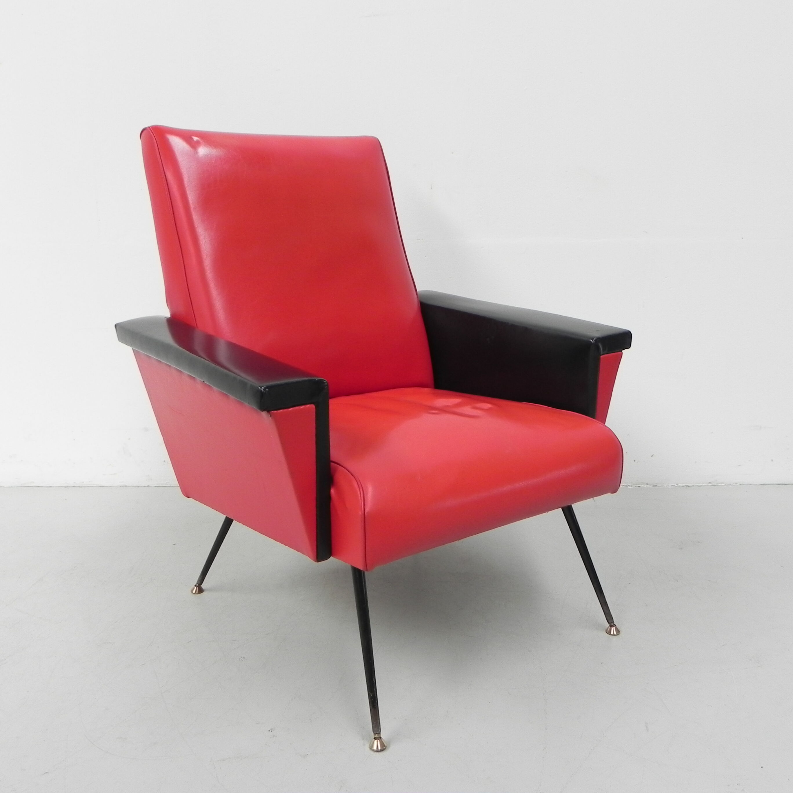 Vintage skai armchair with armrests