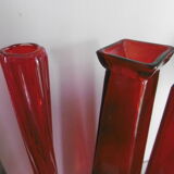 Set of three red bottles