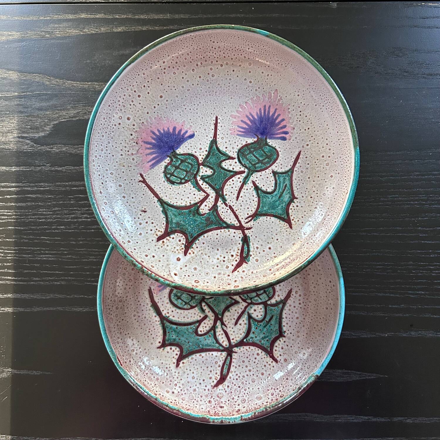Pair of plates with thistle decoration