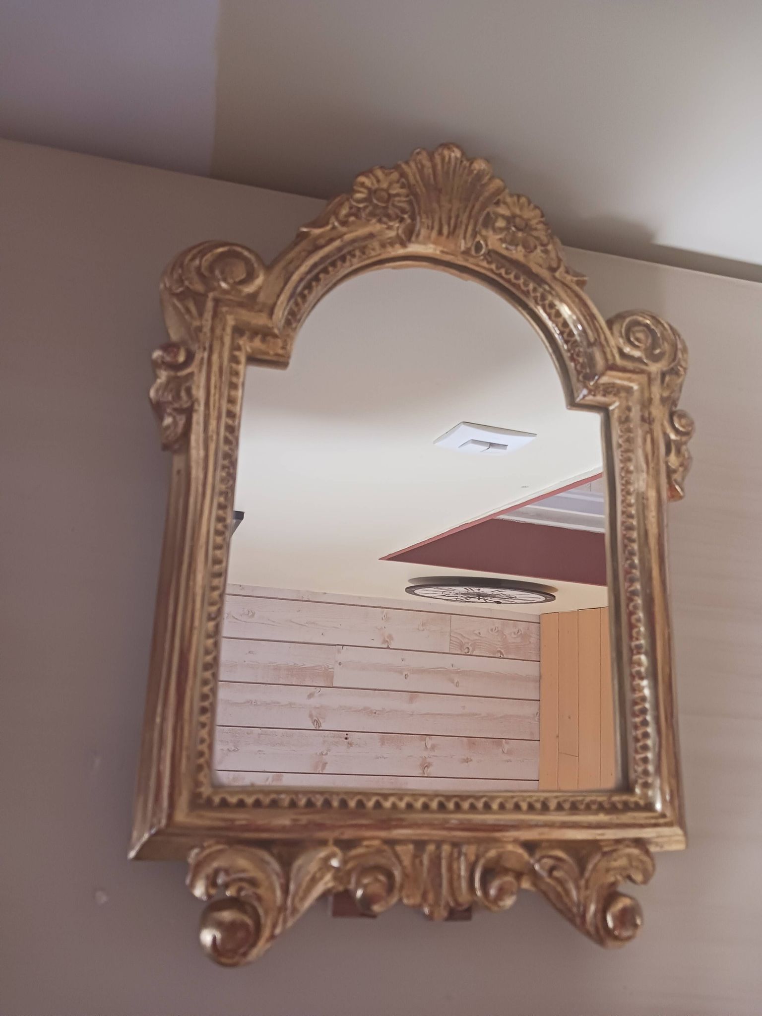 Miroir ancien en bois doré