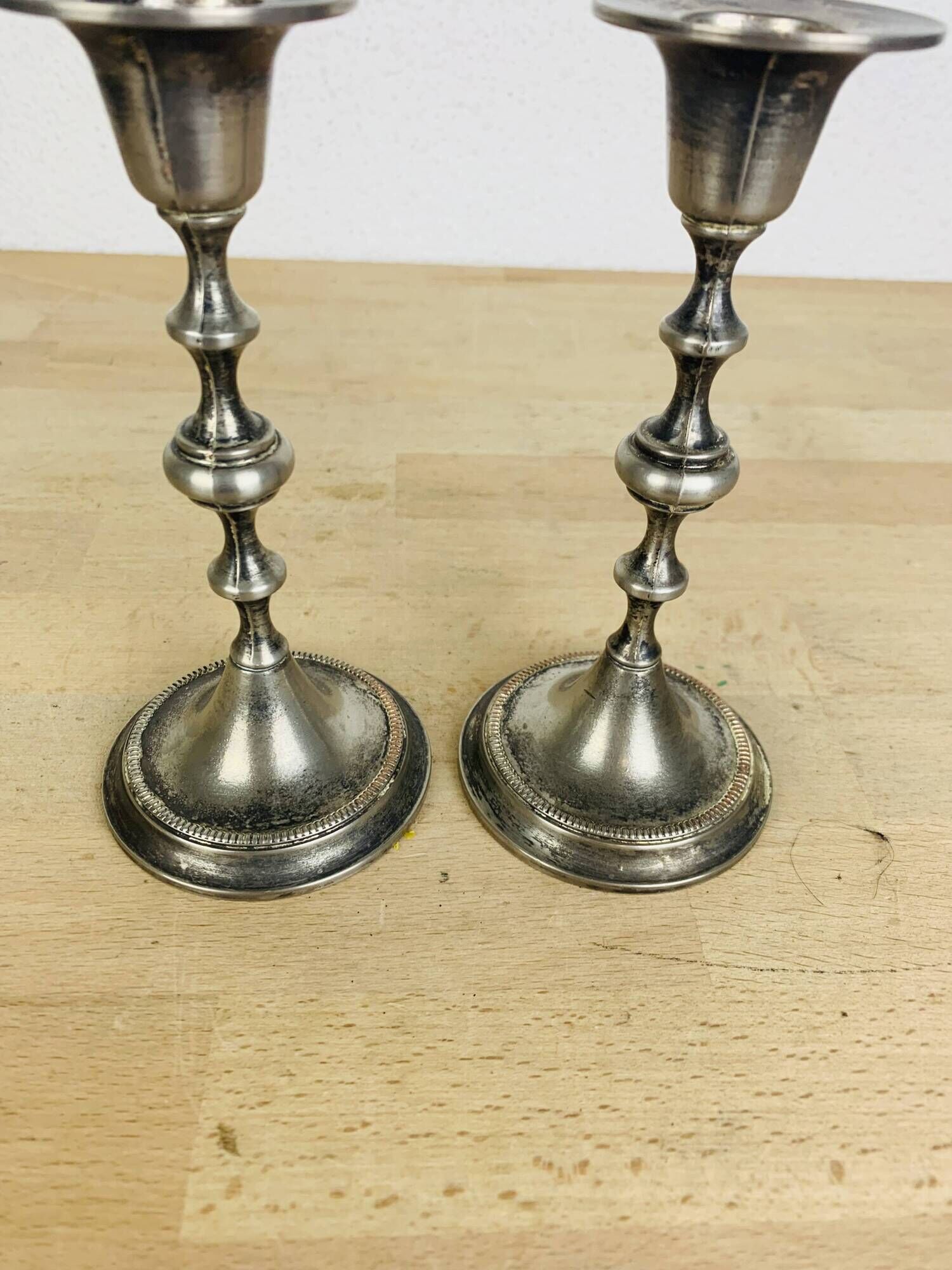 Pair of vintage silver-plated metal candlesticks