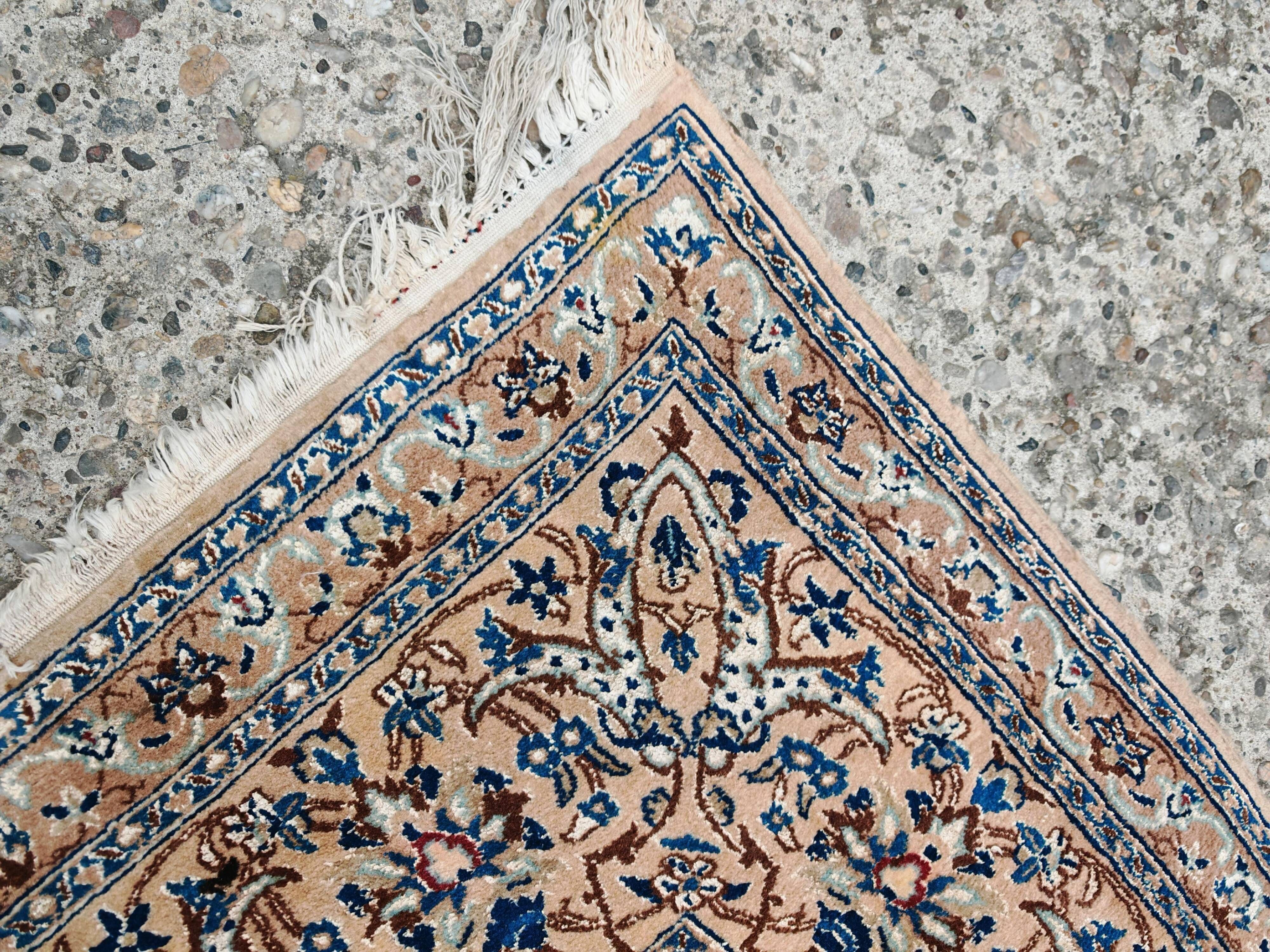 Vintage Persian Nain carpet, handwoven wool and silk from the 1940s.