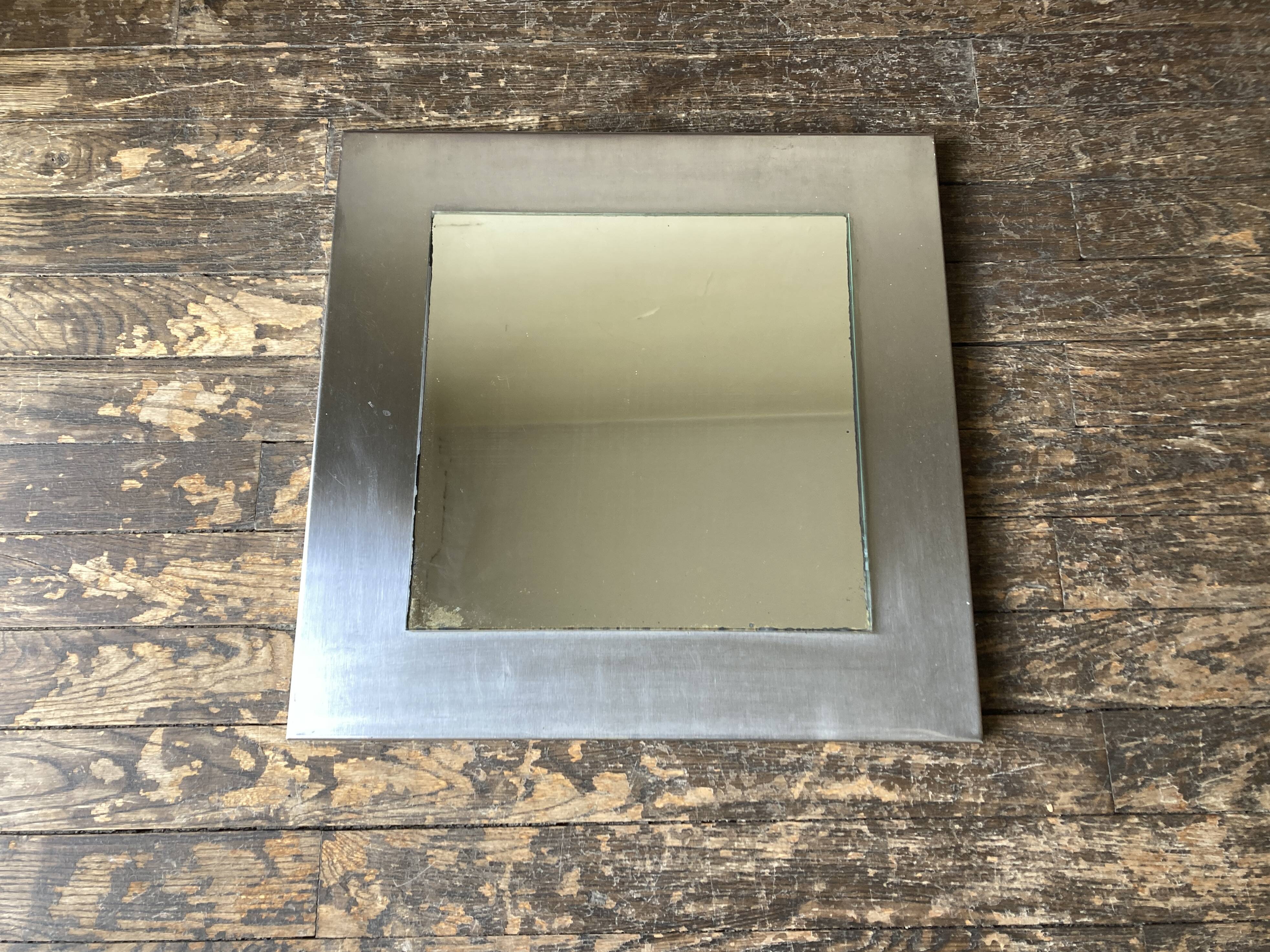 1970s space age steel mirror