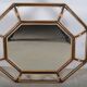 miroir en rotin octogonal