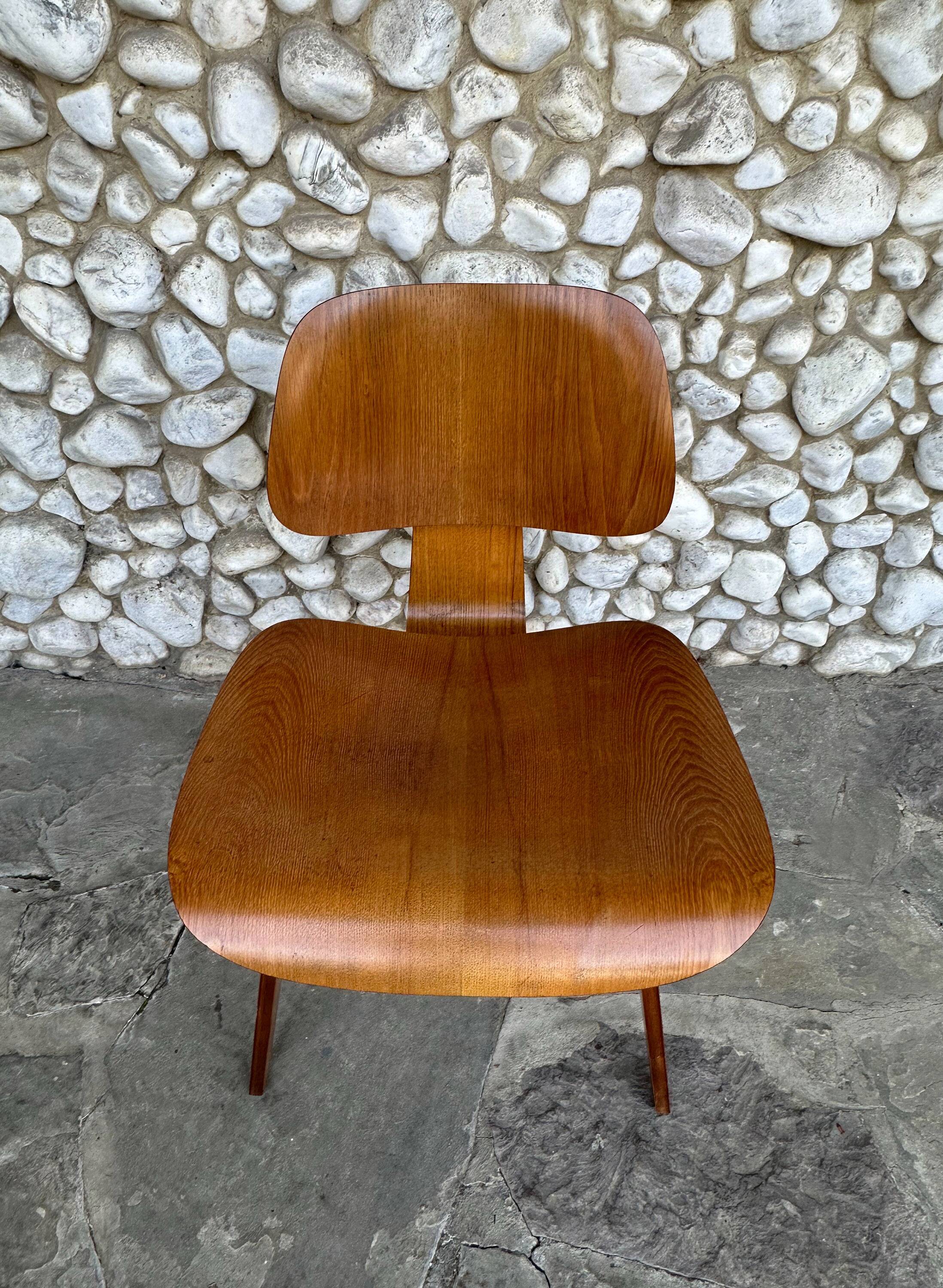 DCW chair in walnut by Charles & Ray Eames for Herman Miller, 1950-53