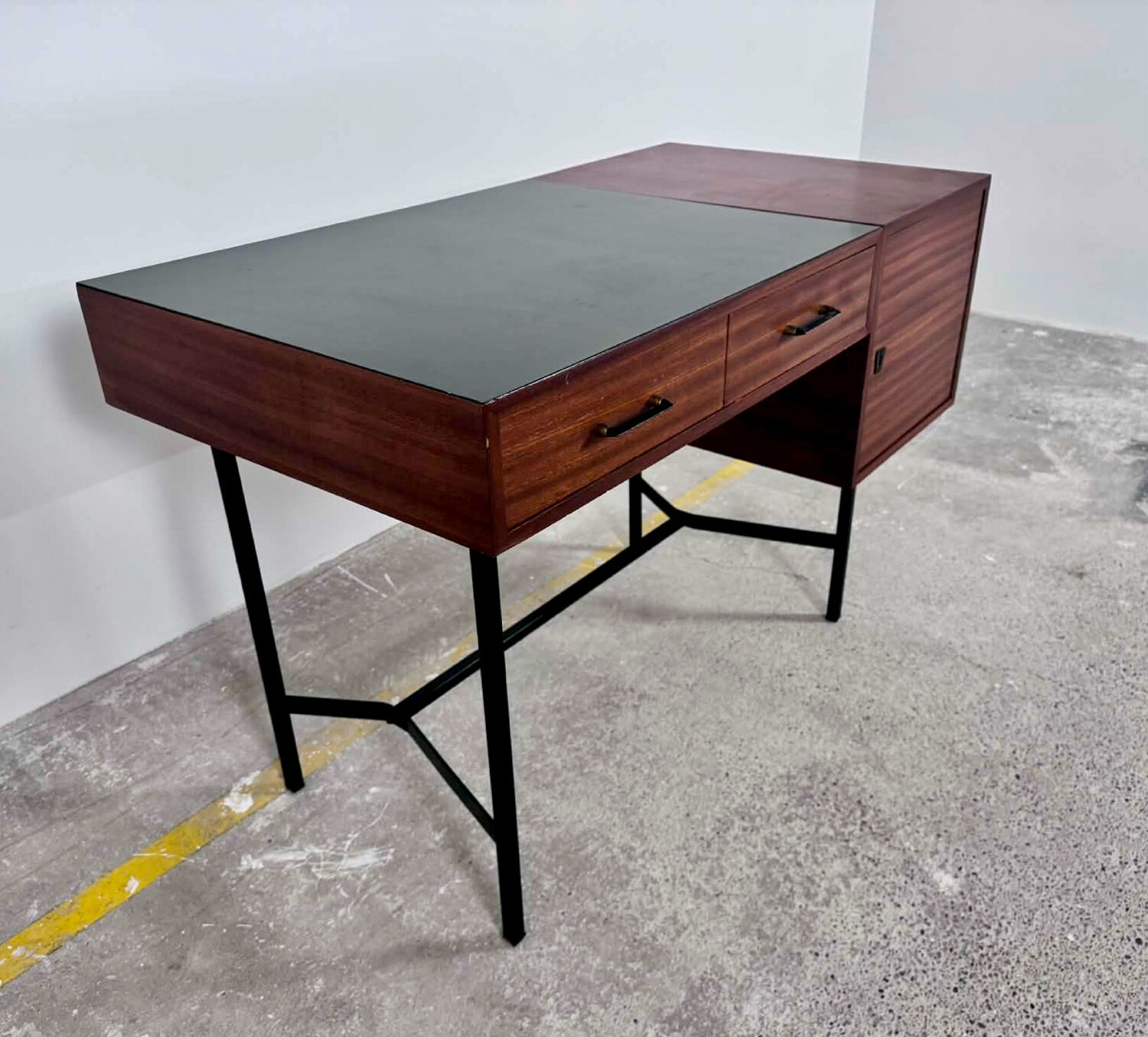 French modernist desk from the 1950s with 2 drawers, 1 cabinet, and 1 container.