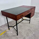 French modernist desk from the 1950s with 2 drawers, 1 cabinet, and 1 container.