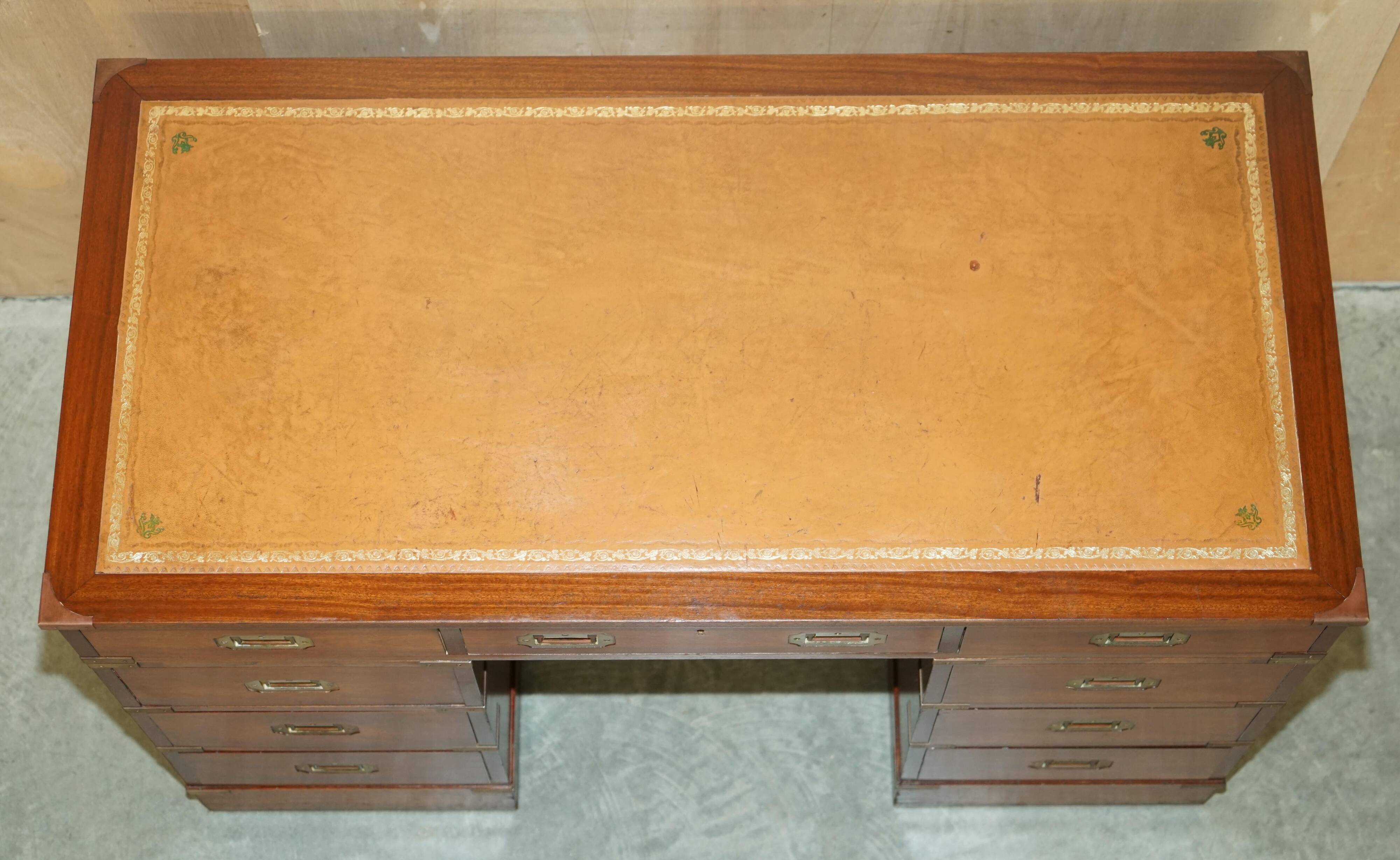 Vintage Harrods Kennedy desk in military campaign style with drawers.
