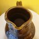 Varnished terracotta pitcher from the 19th century.