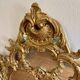 Large gold mirror in Louis XV style